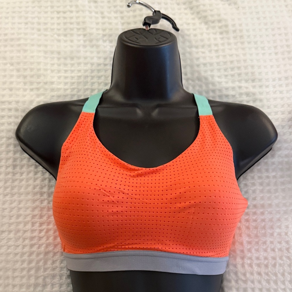 Victoria’s Secret Women’s orange/coral Perforated Sports Bra with Mint Straps